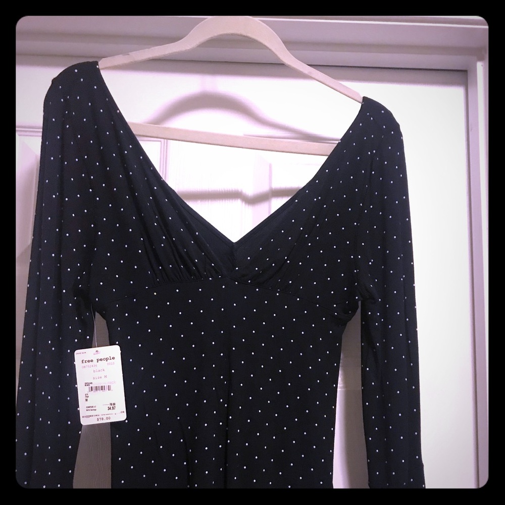Black polka dot shirt